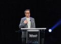 Robert Downey Jr. speaking on stage at D23 Expo 2019