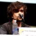 Game of Thrones Cast Net Worth 2026: Richest Stars Ranked Peter Dinklage speaking at a San Diego Comic-Con panel