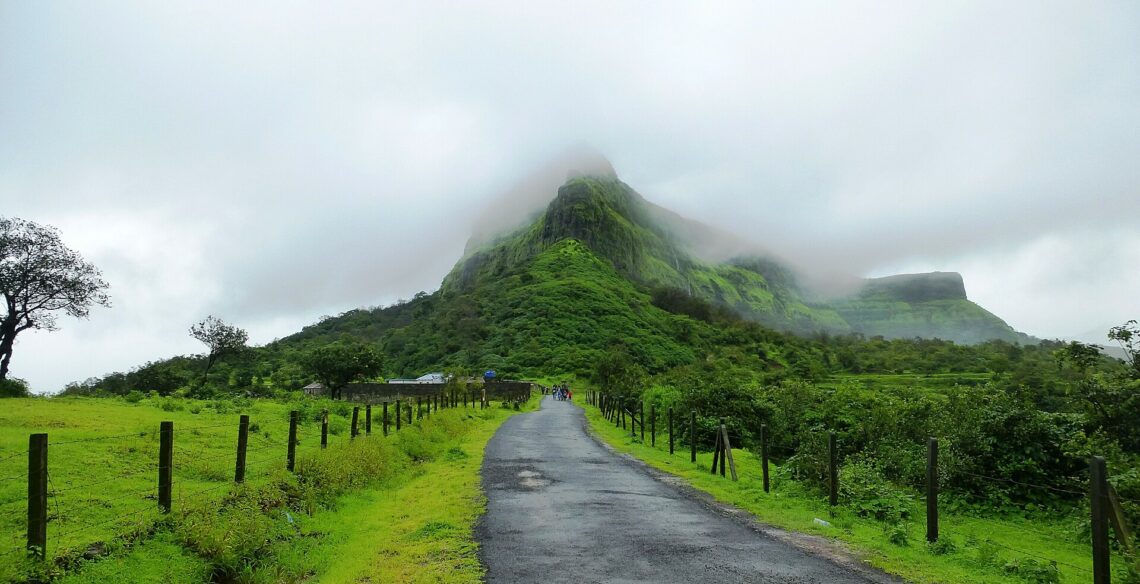 7 Monsoon Treks Near Mumbai for Beginners (With Safety Tips) Visapur fort covered in monsoon clouds near Lonavala