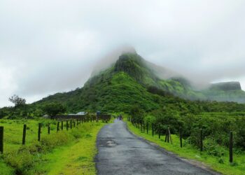 7 Monsoon Treks Near Mumbai for Beginners (With Safety Tips) Visapur fort covered in monsoon clouds near Lonavala