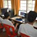 What Is NEP 2020? Key Changes Explained for Students and Parents Students learning on computers at a school in Bengaluru