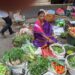 A vegetable vendor at a market in Pune, India