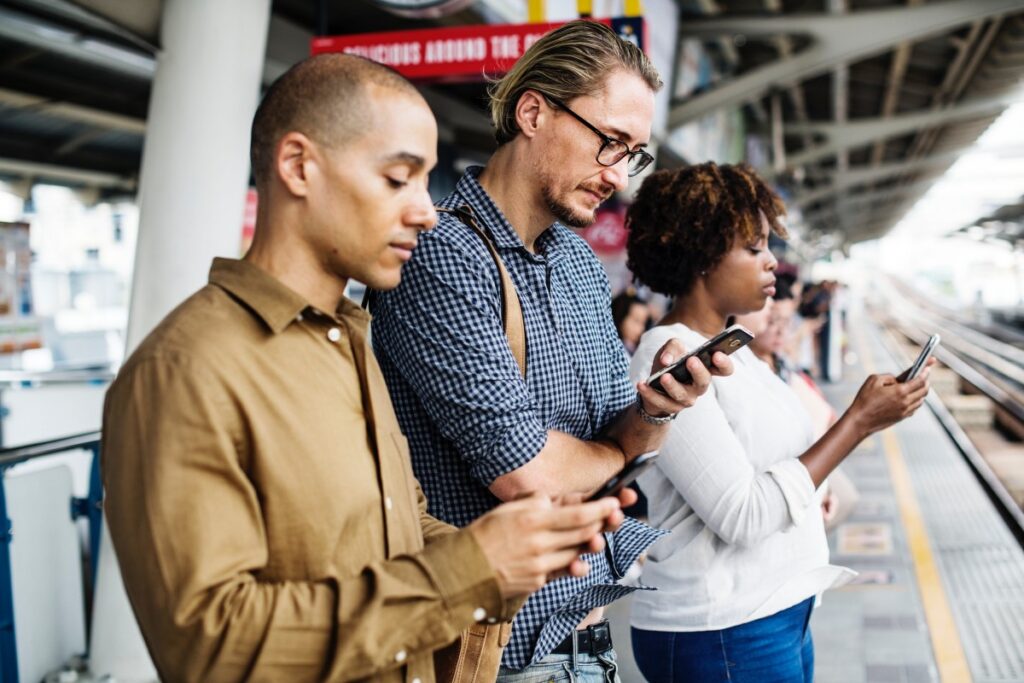 6 WhatsApp Alternatives for Better Privacy in 2026 A person holding a smartphone and typing a message on a chat app