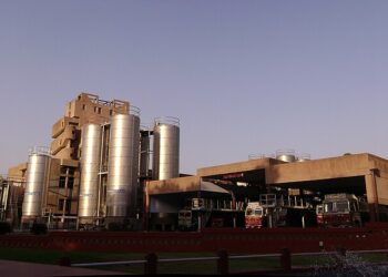 Amul Case Study: How Farmers Built a Rs 1 Lakh Crore Brand Fresh milk being poured at a dairy, illustrating the Amul cooperative case study