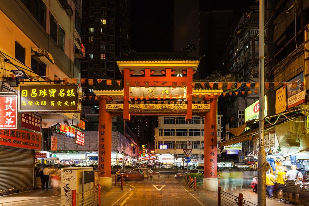 Stalls and crowds at Temple Street Night Market in Yau Ma Tei, Hong Kong