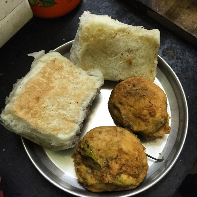 From Chaat to Vada Pav: 8 Best Indian Street Foods by State Vada pav served with fried green chillies, a popular street food in Mumbai