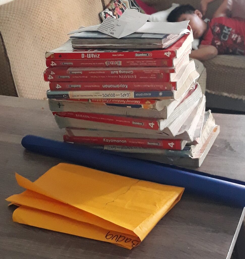 A stack of novels, several of which were adapted into TV shows and films after 2021
