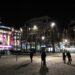 Best Christmas Markets in Europe 2026: Dates for 10 Cities Wooden stalls and Christmas lights at a busy European Christmas market in the evening