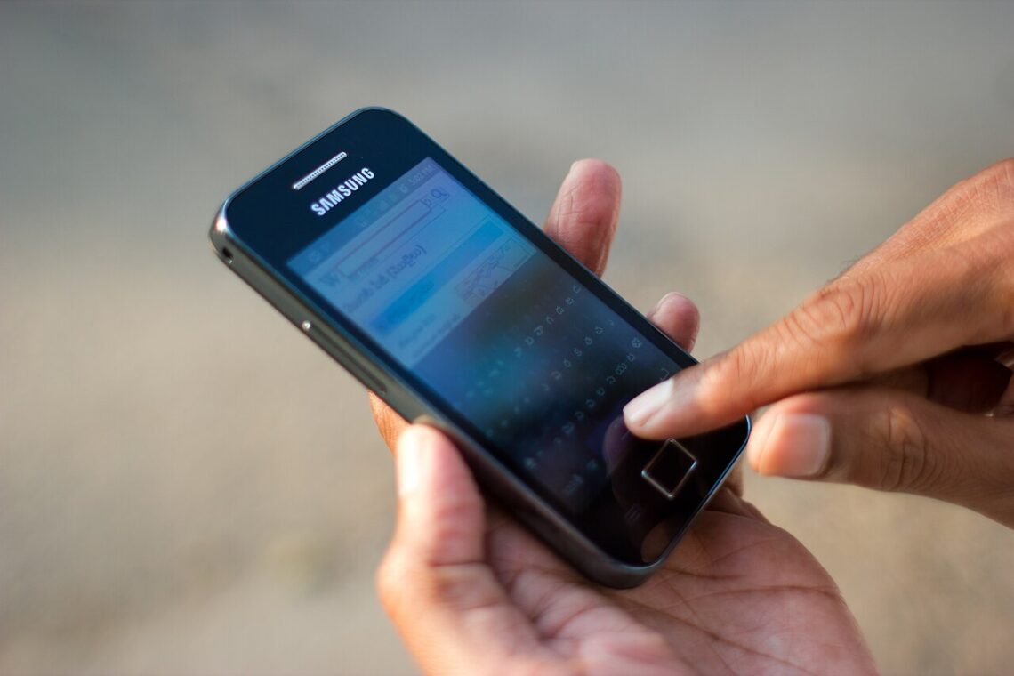 DigiLocker Guide: How to Use It and Which Documents Are Valid A man in Bengaluru looking at his smartphone