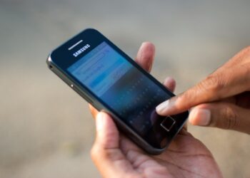 DigiLocker Guide: How to Use It and Which Documents Are Valid A man in Bengaluru looking at his smartphone
