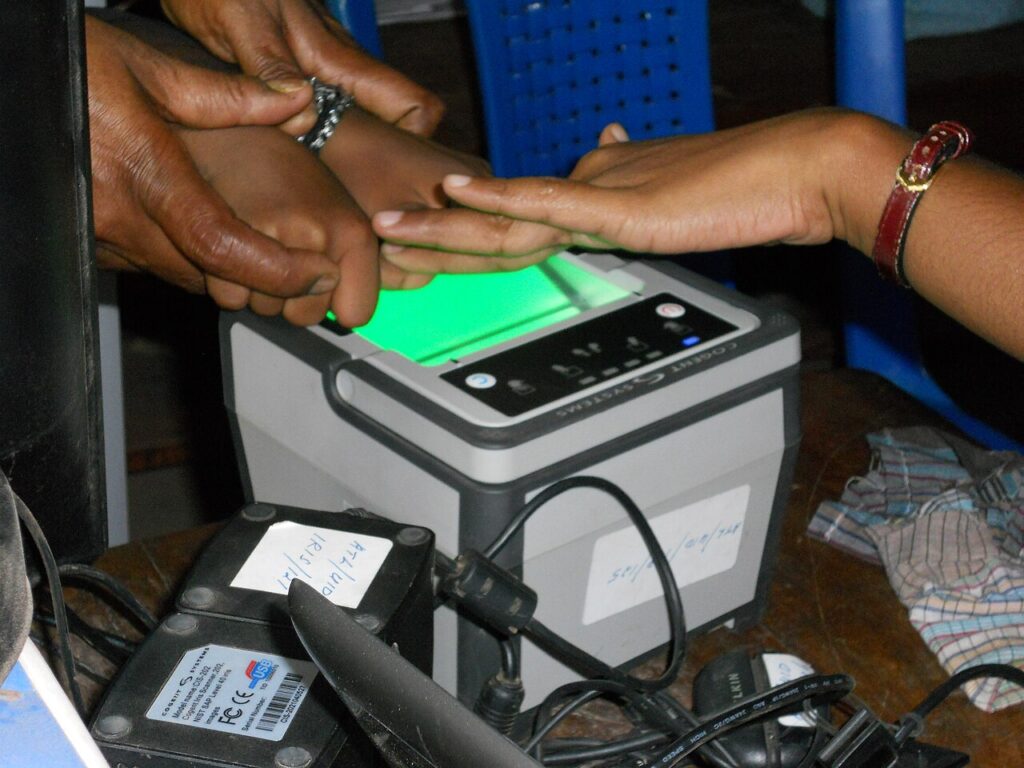 How to Lock Aadhaar Biometrics Online: Step-by-Step Guide Aadhaar enrolment in progress at a centre in India