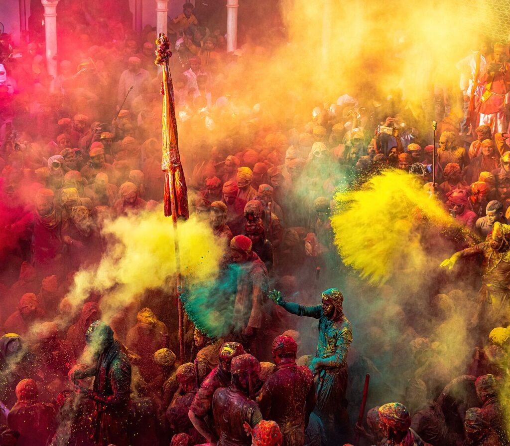 8 Most Colourful Festivals Around the World and When to Go People covered in coloured powder during Holi celebrations in India