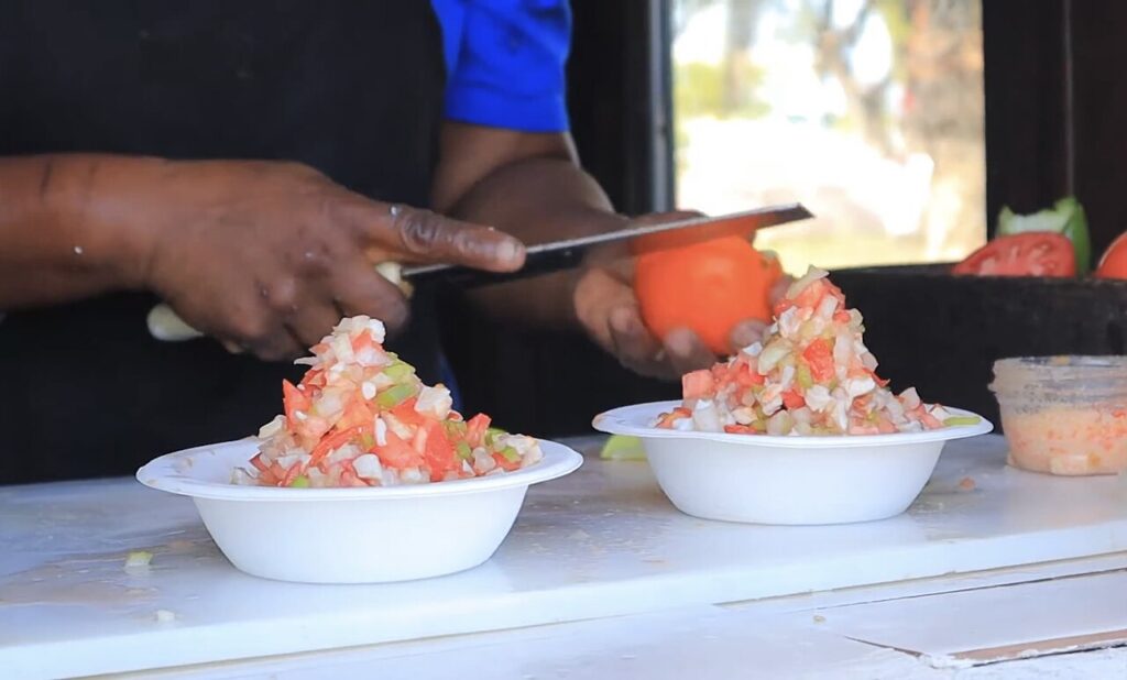 Fresh conch salad with peppers and citrus served at a stall in the Bahamas