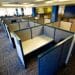How to Tell Your Boss You Feel Undervalued at Work (With a Script) Empty office cubicles