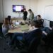 Critical Success Factors (CSFs): Meaning, Examples and How They Differ From KPIs A team meeting in an office